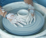 throwing on potters wheel